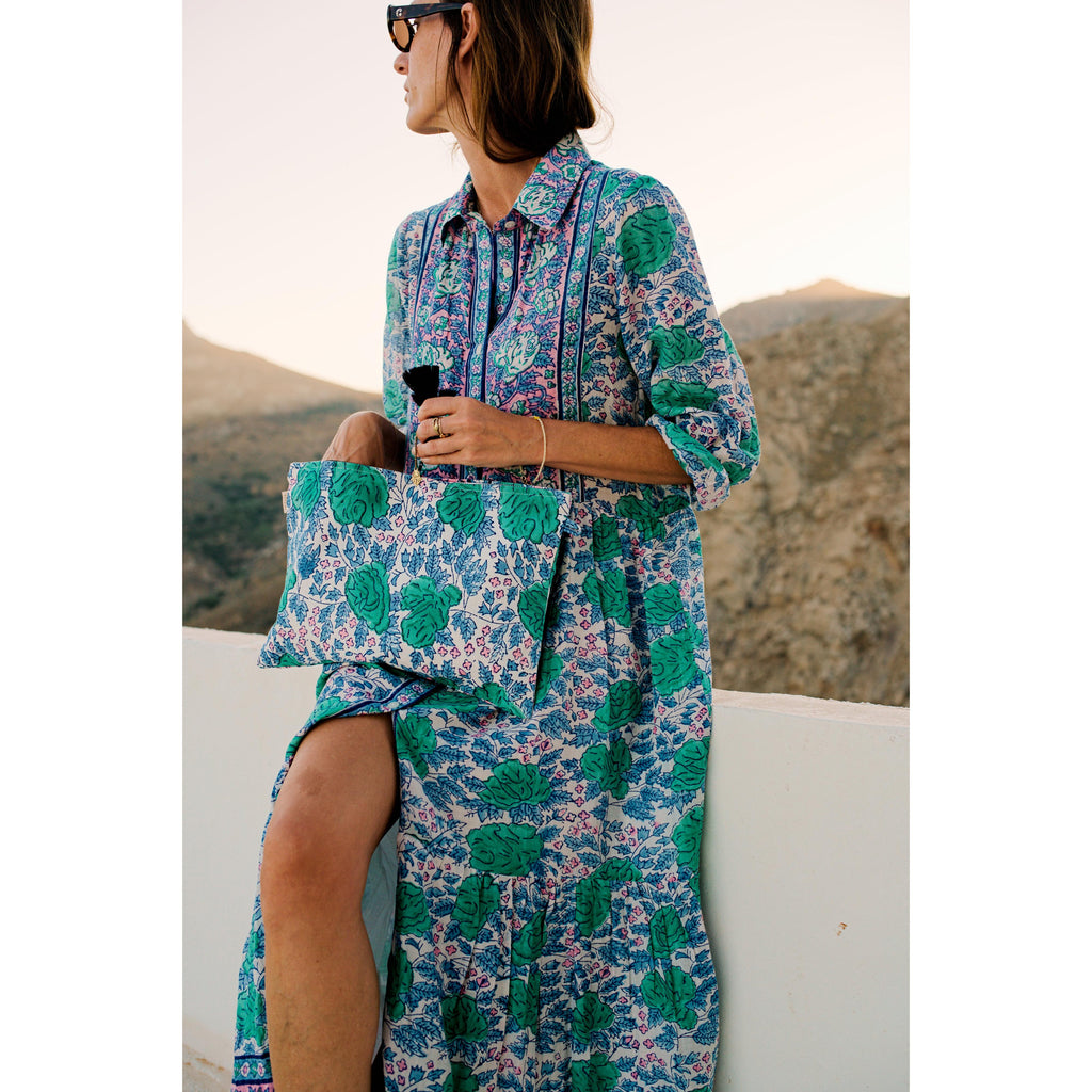 button front midi dress PRINT SHORT SLEEVE This midi dress blends soft blue floral stripes with an easy Perfect For You Black Floral